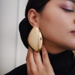 Women Gold Plated Comtemporary Drop Earrings
